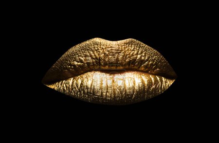 Photo for Closeup sexy beautiful female golden lips isolated. Gold lipstick. Gold lips. Gold Paint from the lips. Golden lips on beautiful model girls mouth - Royalty Free Image