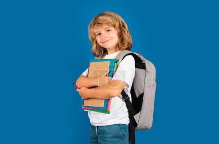 Photo for Back to school. School child with book on isolated background - Royalty Free Image
