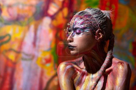 Photo for Art model girl portrait with Creative make up. Paint female model face. Abstract body. Art body design. Creative body art and hairdo. The Creative Face art - Royalty Free Image