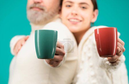 Photo for Family coziness concept. Happy couple at routine morning with cup of coffee or tea. Enjoying nice family cozy having a romantic moments - Royalty Free Image