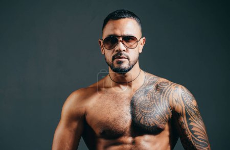 Photo for Sungalass male portrait. Mans fashions sungalass. Handsome man closeup portrait. Stylish latin man. Handsome guy sad and strong. Face closeup - Royalty Free Image