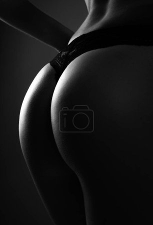 Foto de Sexy butt of sensual woman, buttocks in bikini, ass with thong lingerie close up - Imagen libre de derechos
