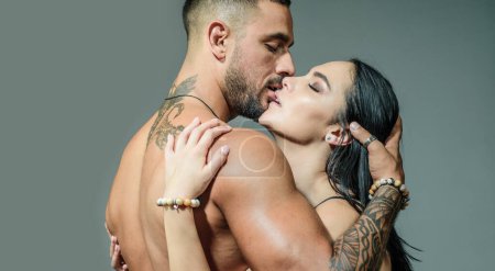 Sensual couple kiss. I Love You. Couple In Love. Romantic and love concept. Hugs together and sensual touch. Sexually explicit. Passionate lover caressing arousing beautiful woman. Dominant man