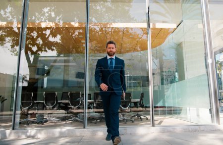 Photo for Manager in a luxury modern open space business center. Successful business man outside - Royalty Free Image