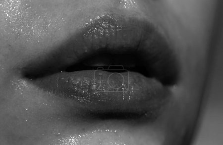Photo for Injections, Plastic Surgery, Collagen and Beauty Treatments. Lip balm. Lipcare lipstick. Close-up of sexy lips - Royalty Free Image