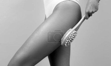 Foto de Female buttocks. Skin treatment. Anti-cellulite body massage for leg and butt. Spa and wellness, body care, cosmetology - Imagen libre de derechos