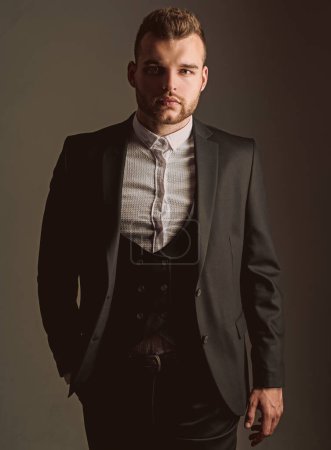 tuxedo man. Modern man suit fashion. Man in classic suit shirt. Business confident. Portrait of handsome serious male model. Ambition and individuality, success. Businessman in work. formal meeting.