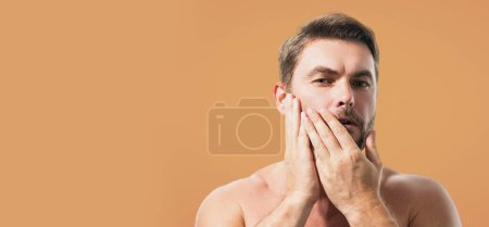 Man cosmetic, skin treatment on studio background. Hygiene and face. Matural mens cosmetics and wellness. Beauty and skincare. Wellness, healthcare and hygiene. Banner for header
