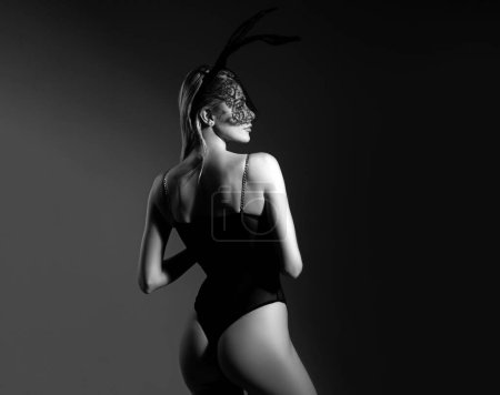 Photo for Naked bunny woman, fashion rabbit. Hot girl. Luxury ass. Stockings. Sexy game costume. Girl in sexy black lingerie and stockings. Temptation - Royalty Free Image