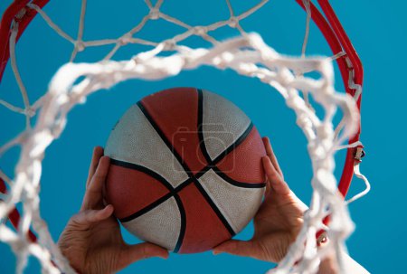 Photo for Basket ball, basketball championship. Basketball as a sports and fitness symbol of a team leisure activity playing. Hands and basketball - Royalty Free Image