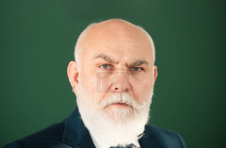Photo for Closeup face of professor or teacher on blackboard isolated. Senior professor with gray hair in college - Royalty Free Image