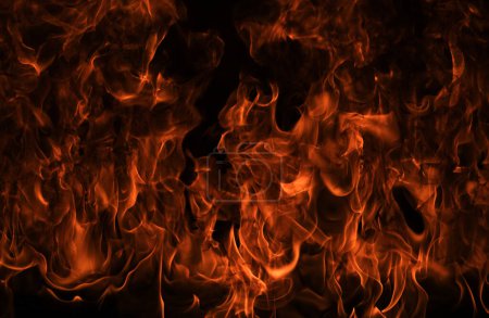 Foto de Llamarada llama de fuego ardiente sobre fondo de textura de arte - Imagen libre de derechos