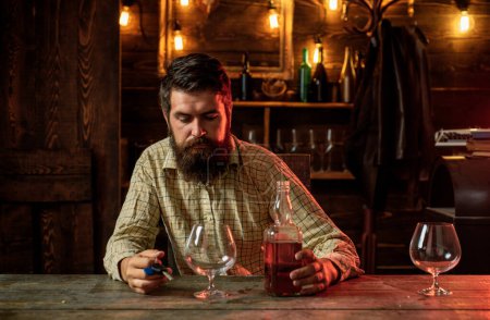Photo for Swag guy with alcohol at home. Drink barman. Pub retro vintage interior. Hipster barman concept. Drunk man. Whiskey, brandy, cognac concept - Royalty Free Image