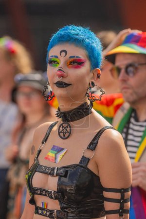 Photo for Hamburg Gay Pride, 5 august 2023: Portrait of Lesbians woman with lgbt rainbow flag on street during pride festival. Female gender identity concept. Lesbian pride month. Lesbian at gay pride event - Royalty Free Image