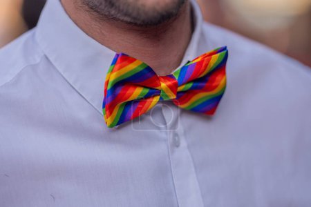 Photo for Rainbow gay flag on bow tie. Rainbow symbol of lgbt people, diversity of genders love. Lgbtq community pride month. Flag lgbt. Gay pride parade. Pride month - Royalty Free Image