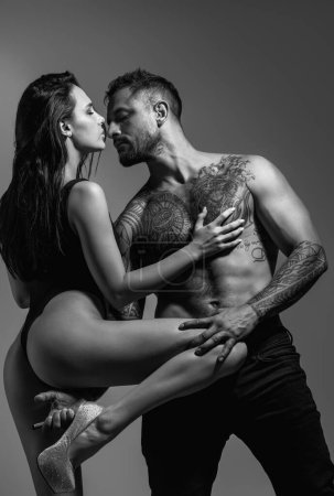 Photo for Latin lover. Young couple embracing and hugging. Love moments for sensual sexy couple. Sexy couple in love, sensual relationship. Touching body and pleasure. Passion dating of young lovers - Royalty Free Image
