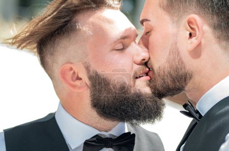 Gay kiss on wedding. Marriage gay couple tender kissing. Close up portrait of gay kissed. Gay couple wedding. Homosexual couple celebrating wedding, LBGT couple at wedding ceremony, LGBTQ