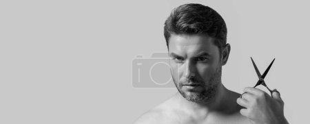 Photo for Banner for header, copy space of men hairstyle, haircut. Middle aged man with scissors cut hair. Men haircare, beauty barber concept. Bearded guy, with scissors. Cut hair with scissors - Royalty Free Image
