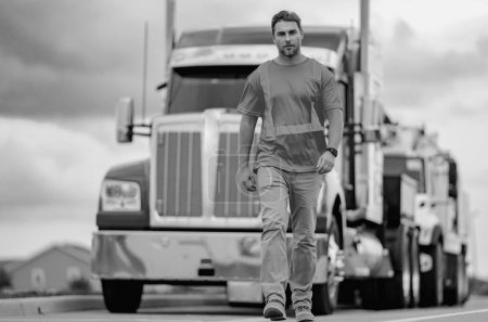 Photo for Men driver near lorry truck. Man owner truck driver in safety vest near truck. Serious hispanic man trucker trucking owner. Transportation industry vehicles. Handsome man driver front of truck - Royalty Free Image