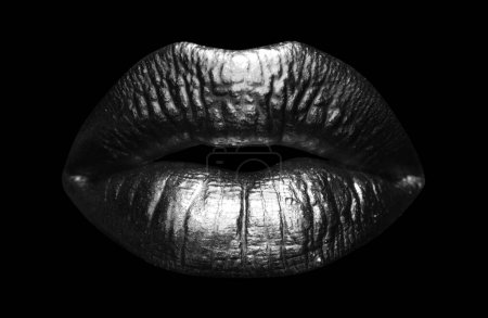 Photo for Beautiful lipped woman gold mouth. Sensual golden lips, sexy lip - Royalty Free Image