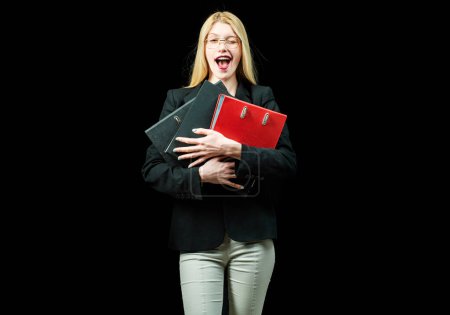 Businesswoman or secretary winking and holding folders , black isolated