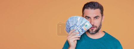 Photo for Middle aged man holding cash dollar bills. Big luck, banner. Dollar cash money concept. Rejoices to win cash. Man hold cash money - Royalty Free Image