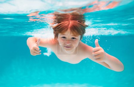 Photo for Child face underwater with thumbs up. Summer kids portrait in sea water on beach. Child swim and dive underwater in the swimming pool. Active healthy holiday - Royalty Free Image