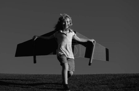 Freedom carefree and kids dream. Child dreams of future. Kid pilot aviator dreaming. Child dream concept. Blonde cute daydreamer child dream on fly. Dreams imagination. Creative kid dreaming of fly