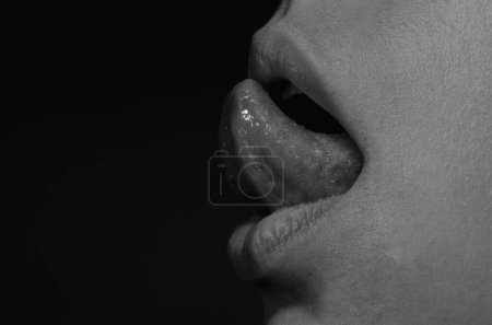 Photo for Licking suck tongue out. Sensual mouth. Woman tongue sensuality licking lips. Sensual sexy beautiful female mouth with tongue sticking out. Close up of woman sensual tongue. Lick, woman licking macro - Royalty Free Image