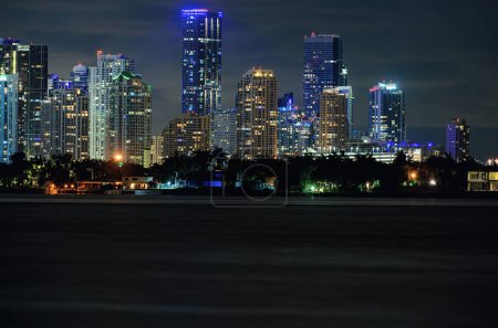Photo for Miami business district, lights and reflections of the city. Miami skyline - Royalty Free Image