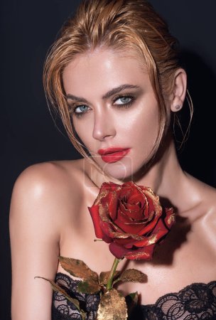 Photo for Beauty girl with red rose. Beautiful sensual woman hold flowers, studio portrait - Royalty Free Image
