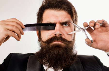 Bearded man with long moustache. Man in barbershop. Handsome bearded man with long beard moustache and brunette hair on white background. Brutal hipster in barbershop
