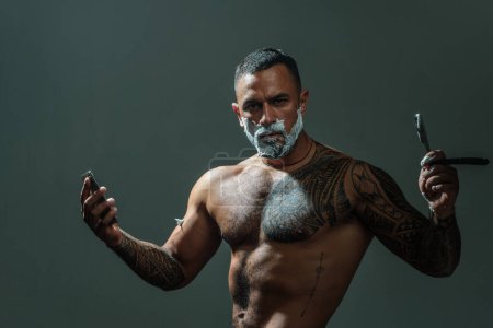 Latin man Shaving and razor. Barber - Shaves and Trims. Shaving Cream and Moustache Wax. Barber shop design. Advertising and barbershop concept. Portrait of stylish man beard. Brutal guy
