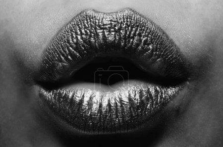Photo for Lip with golden glitter effect. Woman mouth close up. Golden lipstick. Glamour luxury gold mouth. Gold paint on lips. Golden lips on woman mouth. Metallic body. Gold concept - Royalty Free Image