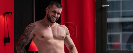 Photo for Seductive gay. Muscular body of man. Strong brutal guy. Sexy male naked torso. Nude muscular body man with tattoo showing fit muscular strong body. Muscular gay - Royalty Free Image