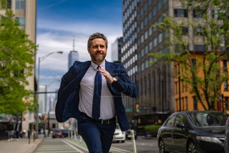 Photo for Business man in suit run in NY. American business. Businessman run down street, late for a meeting. Businessman in suit run be success. Running business man. Fast business. Run and late businessman - Royalty Free Image
