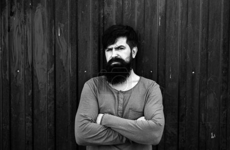 Photo for Handsome hipster man with beard. Serious man looking at camera - Royalty Free Image