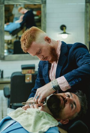 Trims. Beard balm. Beard care. Hair style and hair stylist. Fine Cuts. Professional hairstylist in barbershop interior. Hair Preparation is just for the dashing chap. Razor blade