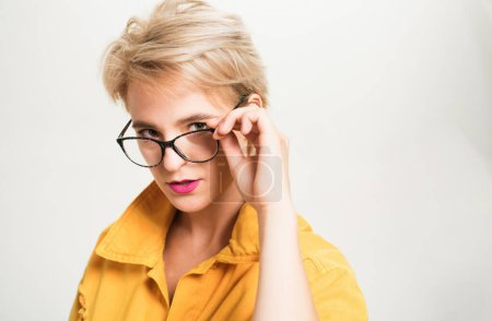 Woman adorable blonde wear eyeglasses close up. Eyewear fashion. Add smart accessory. Stylish girl with eyeglasses. Eyesight and eye health. Good vision. High quality lens. Fashionable eyeglasses.