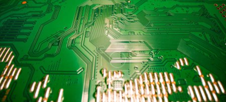 Electronic circuit board technology background. Electronic plate pattern. Circuit board, electrical scheme. Technology background. Electronic microcircuit with microchips and capacitors taken