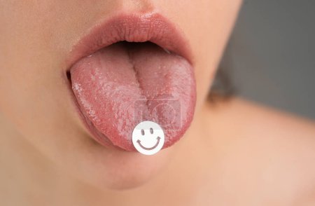 Drug addiction. Tongue with drugs. LSD Psychedelic hallucinogens