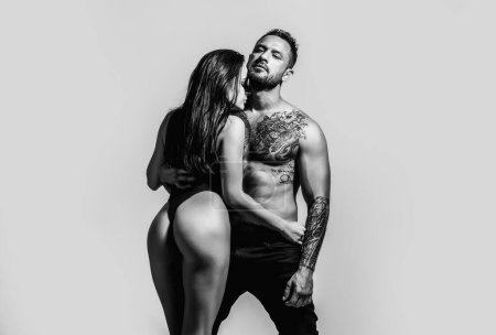 Latin lover. Romantic couple in love dating. Man embracing woman in the tender passion. Sexy couple in sensual love. Foreplay and love games of sexy couple. Sexy seduction. Erotic people concept