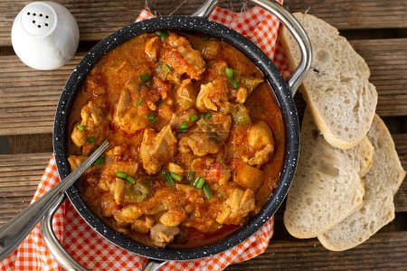 Hungarian traditional dish paprika chicken paprikash with bell peppers
