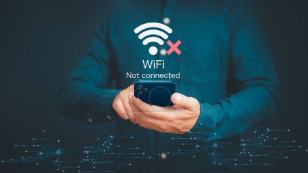 Photo for Man using a mobile phone to connect to wifi but wifi not connected, and waiting to loading digital business data form website, concept technology of waiting for connect to wifi by smartphone. - Royalty Free Image