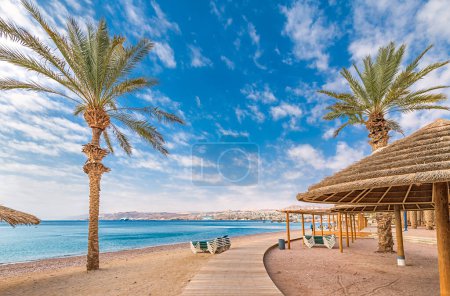 Photo for Resting and recreational area in central beach of Eilat - famous tourist resort and recreation city in Israel and Middle East - Royalty Free Image