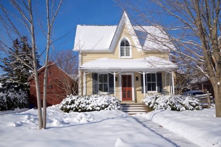 Winter scene - Colonial-era house exterior with snow