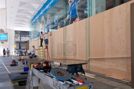 Photo for Toronto, Ontario, Canada - 06/25/2010: Wooden boards were used to prevent windows from smashed in the riot - Royalty Free Image