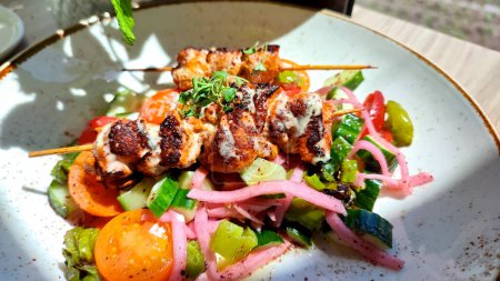 Greek barbecue grilled chicken with salad