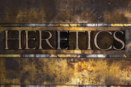 Photo for Heretics text with on grunge textured copper and gold background - Royalty Free Image