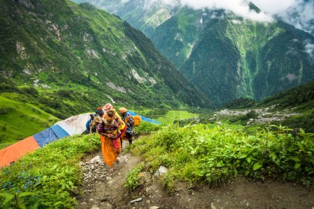 Photo for July 14th 2022, Himachal Pradesh India. Himalayan Sadhus trekking in the mountains during Shrikhand Mahadev Kailash Yatra. - Royalty Free Image
